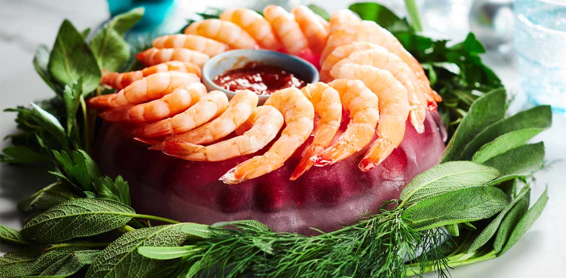 Great idea for a shrimp bowl. Make an ice-ring mold with all the décor  stuff in it for the shell.