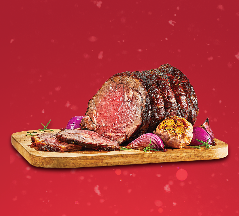 Prime rib easy carve roast on red backdrop