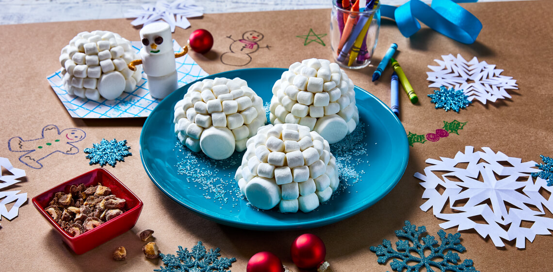  Igloo Hazelnut cupcakes on a blue plate on craft paper