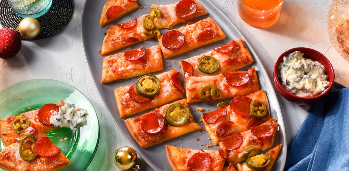 Sweet stinger flatbread on a grey plate and a green plate