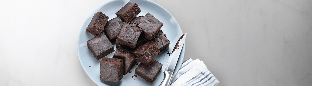 White plate full of date brownies